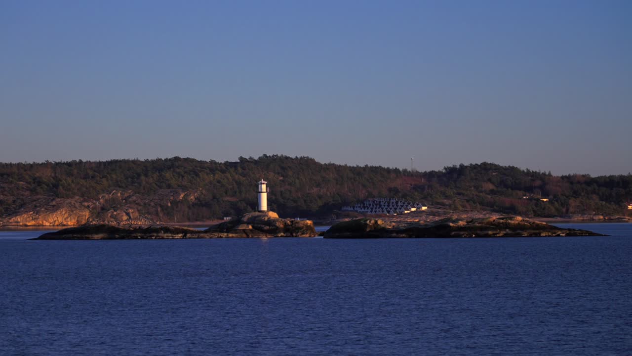 Ursholmen Lighthouse Ytre Hvaler National Park Strömstad Stromstad Oslo Fjord Sweden Sverige Norway Norge golden hour Arctic sunlight sunset ferry boat ride Scandinavia islands parallax right motion