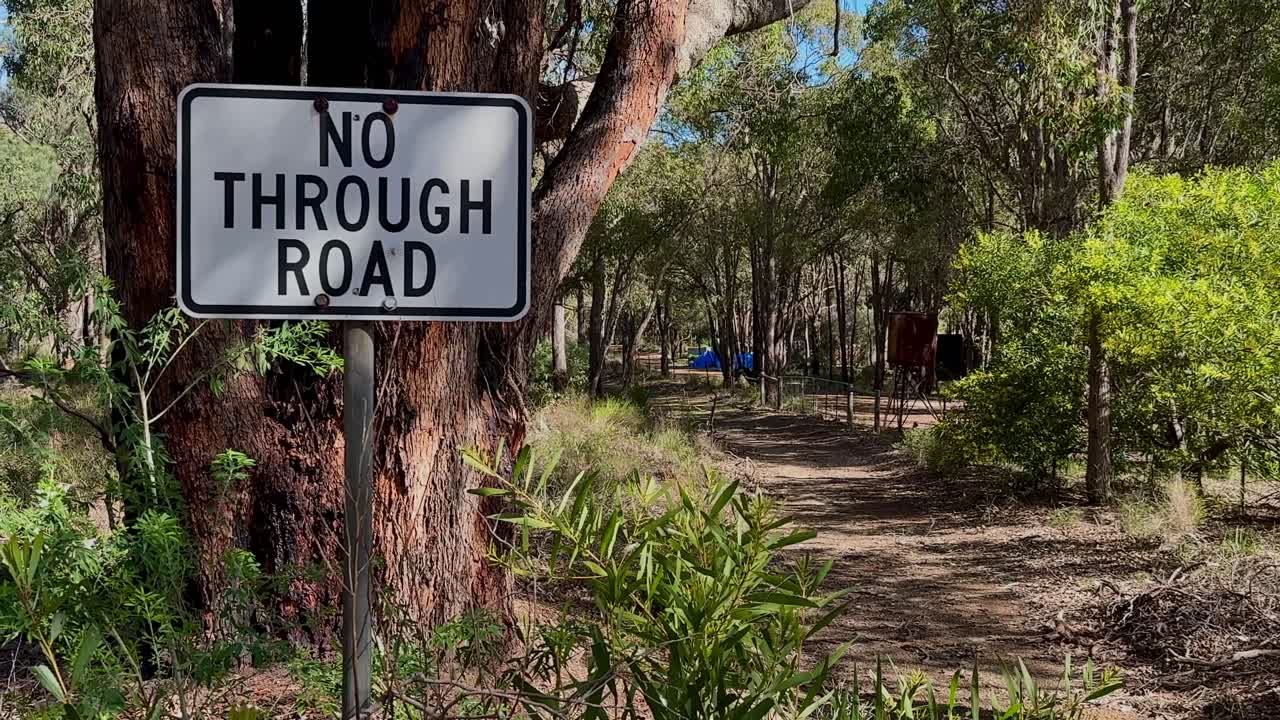 No Through Road Sign Western Australian bush trail Glen Forest National Park trees