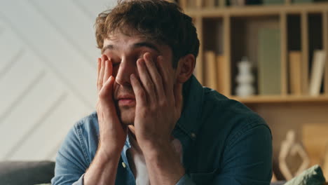 stressed freelancer feeling desperate working remotely close up. upset man