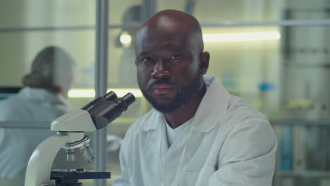 portrait of african american scientist in laboratory