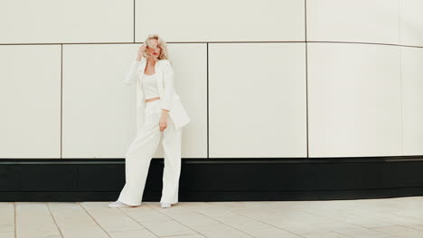 stylish woman in white suit