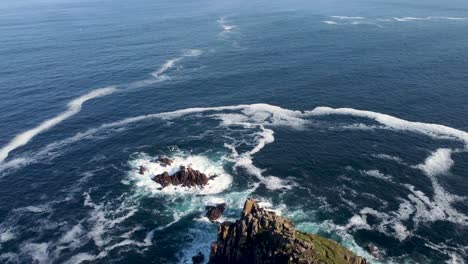 4K-high-altitude-Drone-footage-of-Lands-End-in-Cornwall,-England