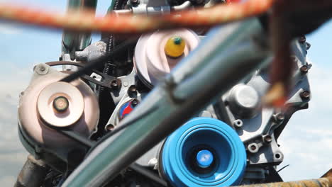 Thailand engine on a Longtailboat driving away from beach, close-up