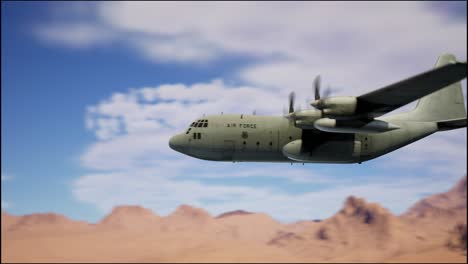 military airplane flying above the mountains on blue sky background. war concept