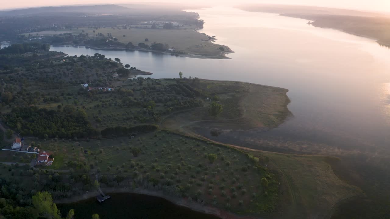 Wide aerial view of a beautiful sun in the largest dam in Portugal in Alentejo, Alqueva.