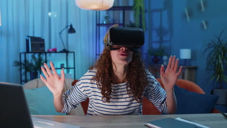 woman using virtual reality futuristic technology headset to play simulation 3d video game at home