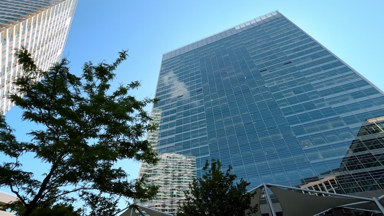 Diverse high-rise buildings of varied design and height. Modern architecture of the contemporary city. Low angle view