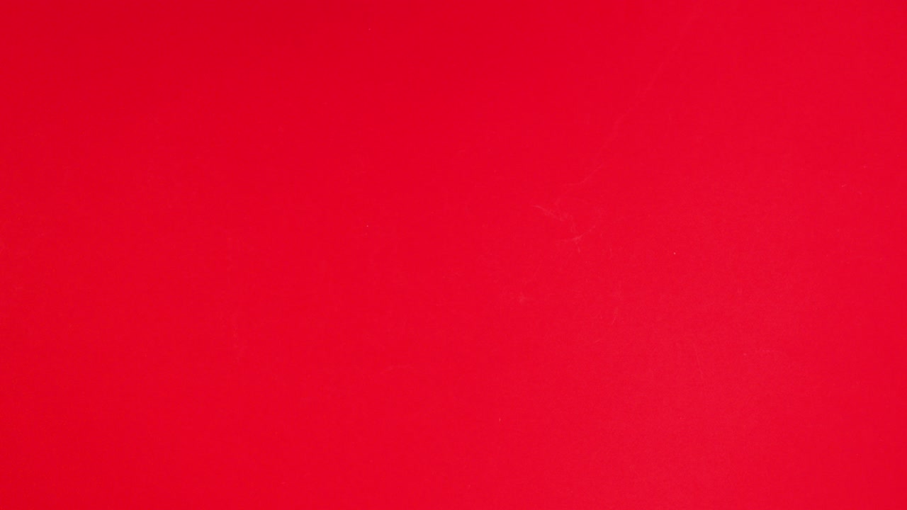 Valentine's day envelope, gift and ribbon appear and disappear on red theme. Stop motion