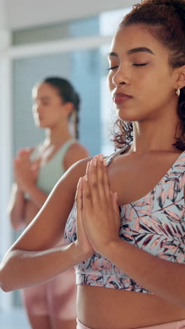 woman practicing yoga meditation in a studio