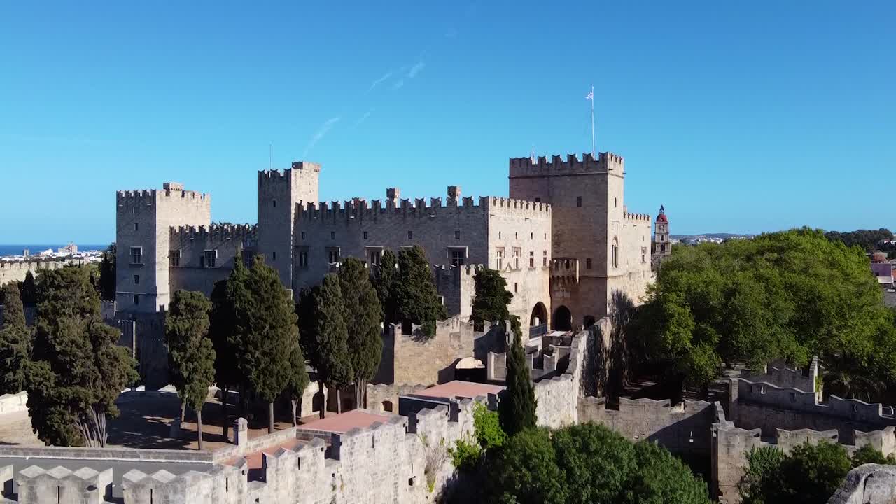 Cinematic drone shot revealing a castle in greek island.