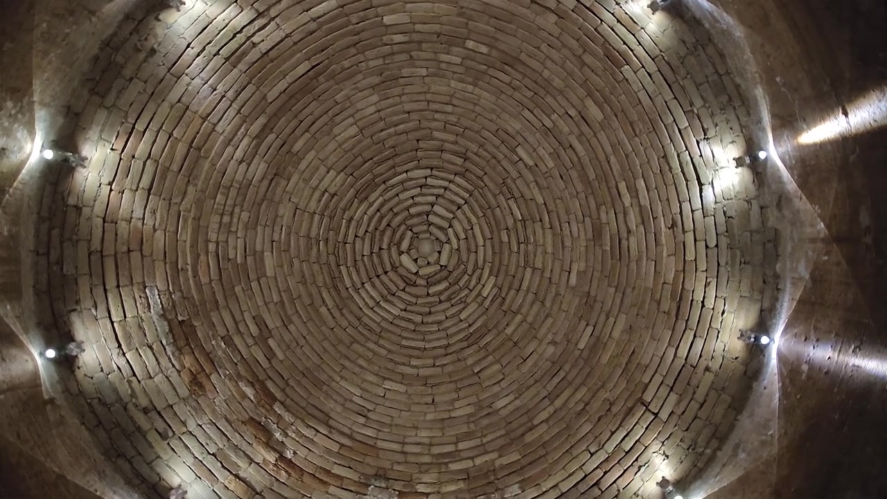 Low Angle View of a Circular Brick Domed Ceiling