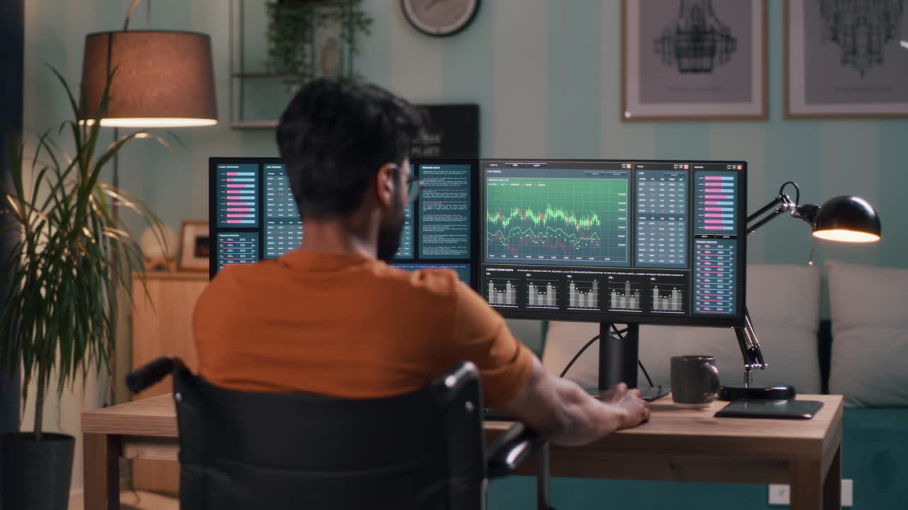 Person using computer at home for investment