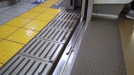 landscape view at platform in the station of subway train line in tokyo japan in feet view style