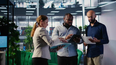 vertical video diverse team of associates engaging in decision making and corporate leadership