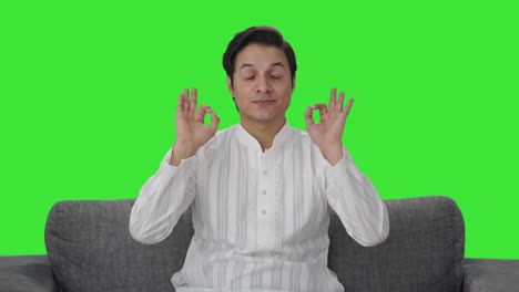 Happy-Indian-man-showing-okay-sign-Green-screen