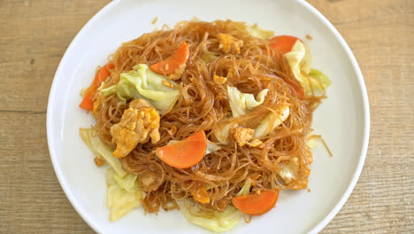 stir fried vermicelli with cabbage, carrot and egg - vegan food style