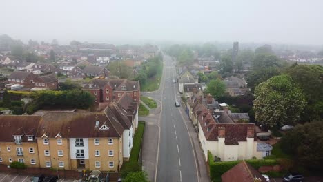 aerial drone slowly moving through empty english town in covid lockdown