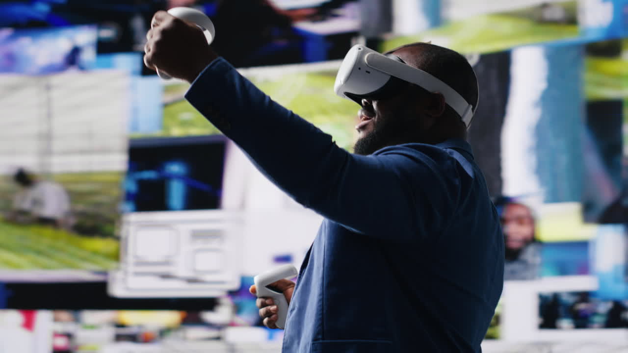 Black male expert uses high tech VR glasses for mobile feeds