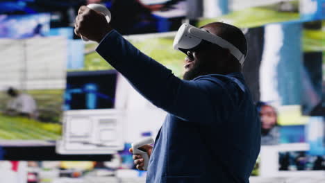 black male expert uses high tech vr glasses for mobile feeds