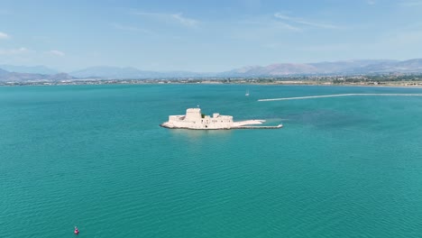 aerial footage of bourtzi water castle in greece