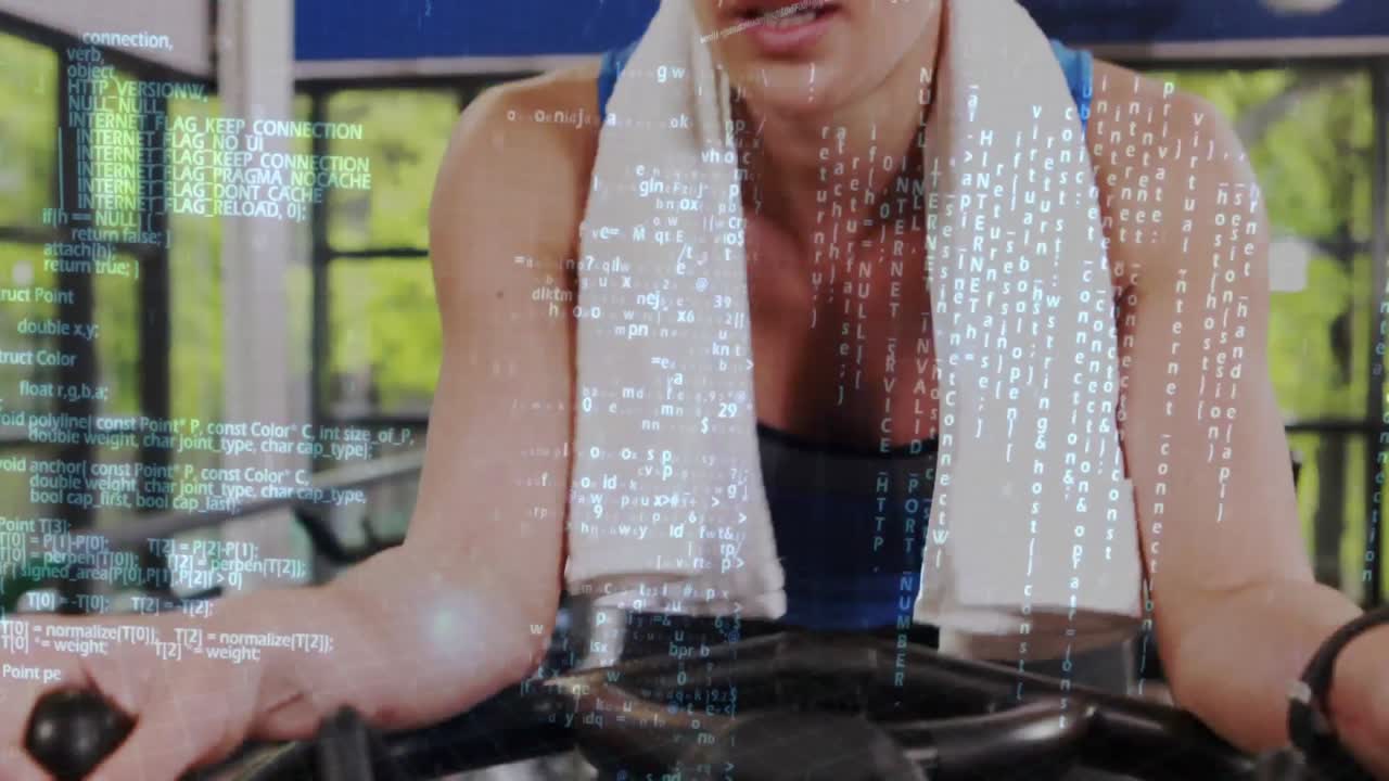 정지 된 자전거 에서 운동 하는 여자