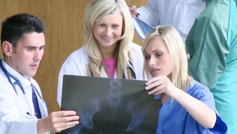 High-view-of-nurses-and-doctors-examining-an-xray-