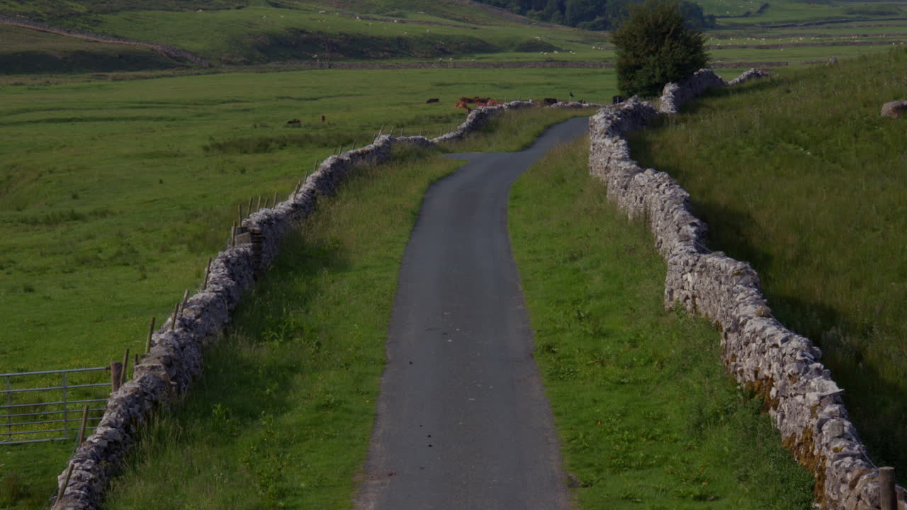 Extra wide shot from Thornton lane looking down Whernside, scales moor, in North Yorkshire at yordas cave,