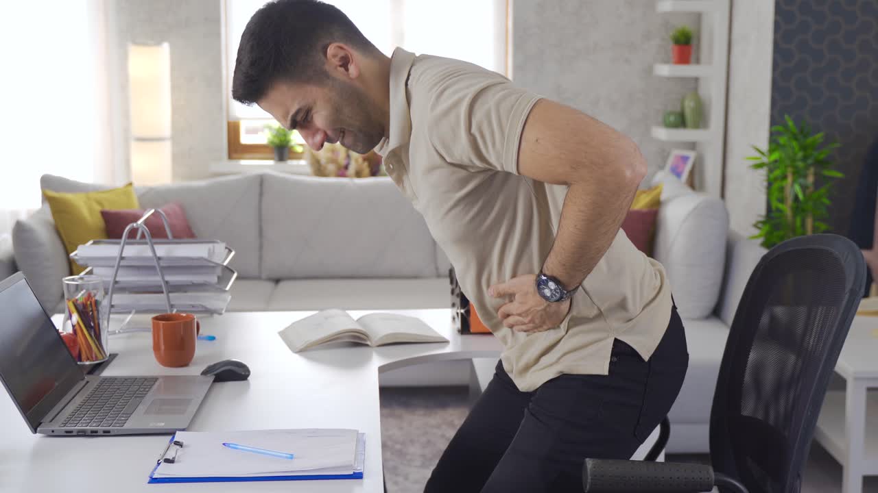 Office worker having stomachache.