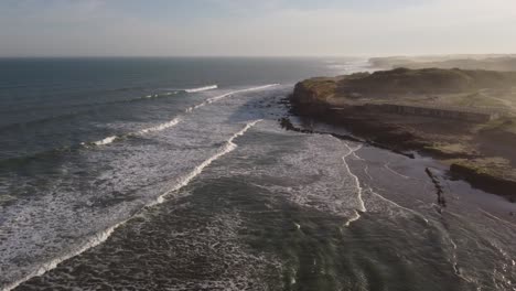 rotating aerial view of dramatic mar del plata coastline