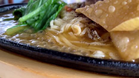 Noodle-soup-is-boiling-on-a-hot-plate