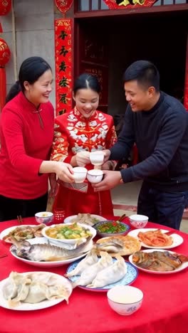 a close-up scene of a chinese family joyfully celebrating the lunar new year at a festive dinner.