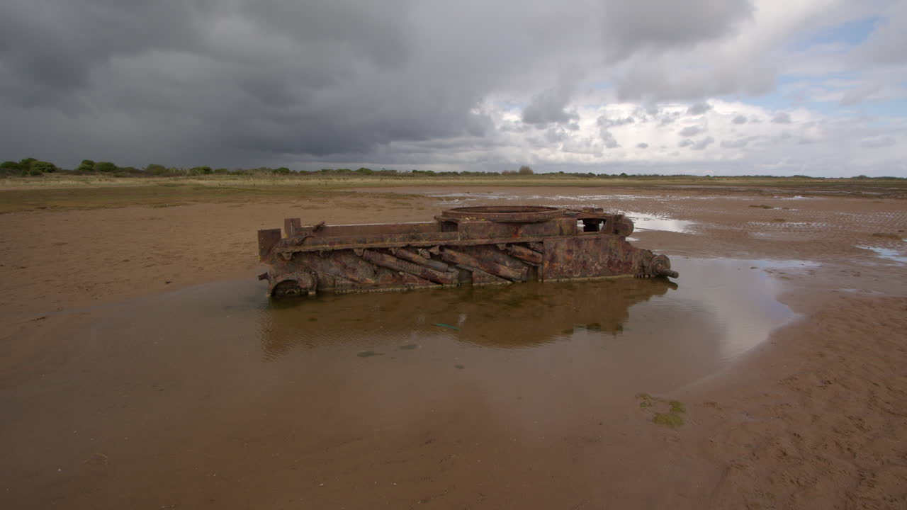 Extra wide shot of the tank on the beach