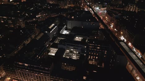 Paris-by-night,-France.-Aerial-backward