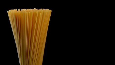 spaghetti rotating on black background