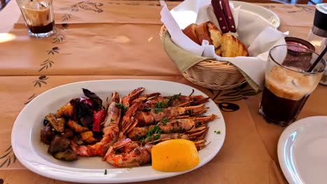 a close-up of traditional crete cuisine with meat and vegetables, showcasing local flavors and mediterranean ingredients