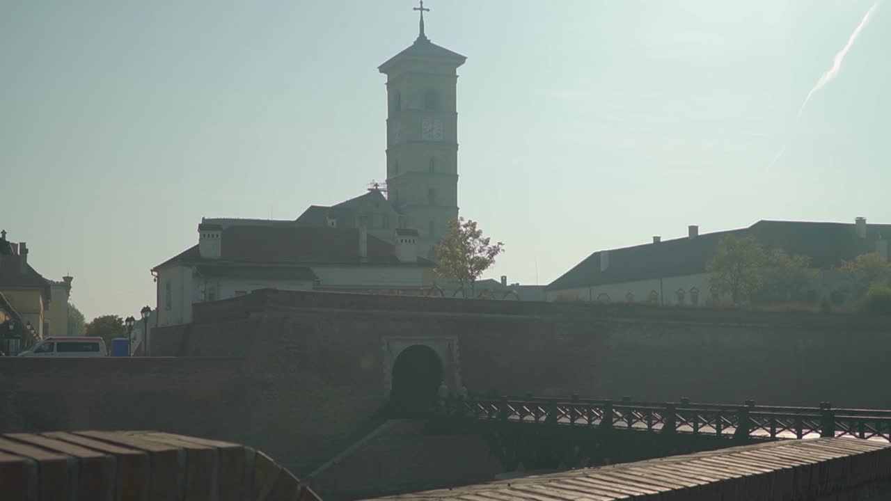 Scenic View Of The Ancient Catholic Church At The Center Of Alba Lulia In Transylvania, Romania On A Sunny Day - Tilt-Up Shot