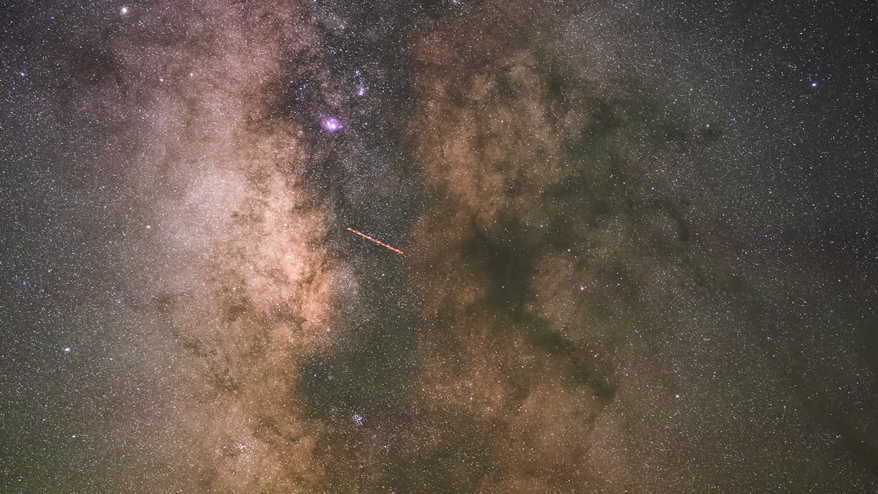 Timelapse Footage of Sparkling Stars Drifting Across a Tranquil Night Sky