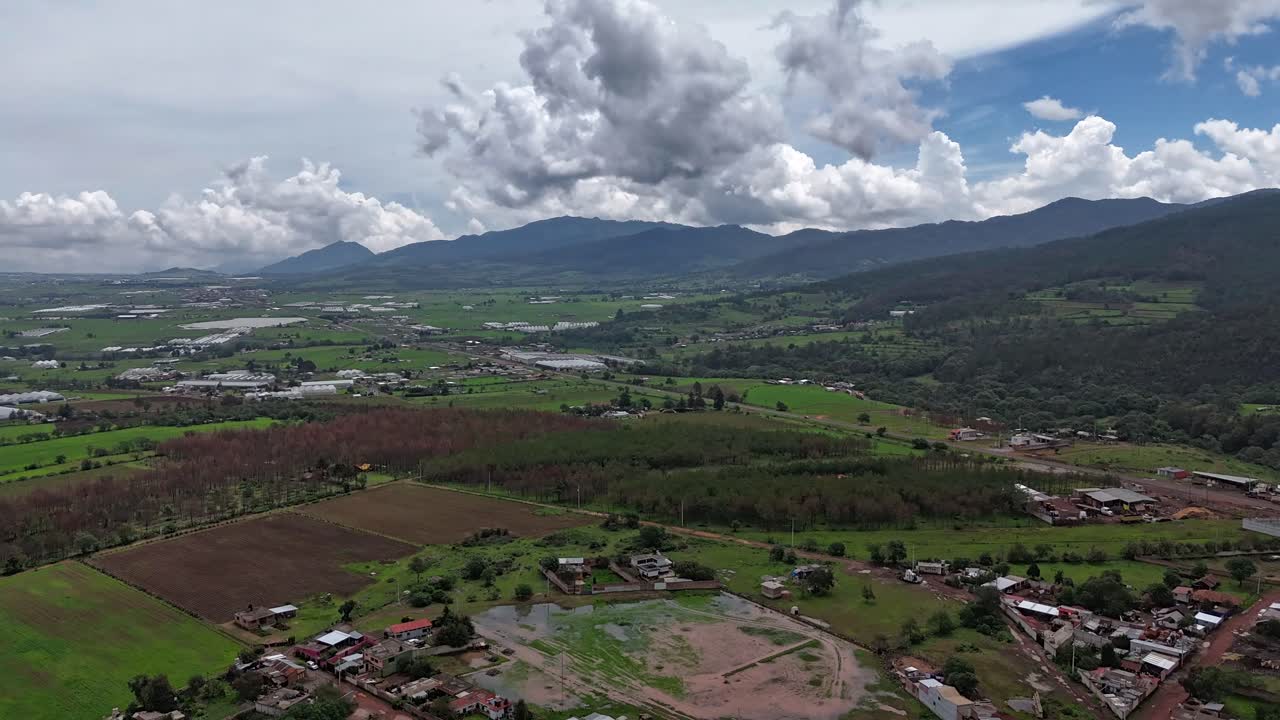 Aerial View of Cumulus Clouds Forming Over Mexican Agricultural Valley