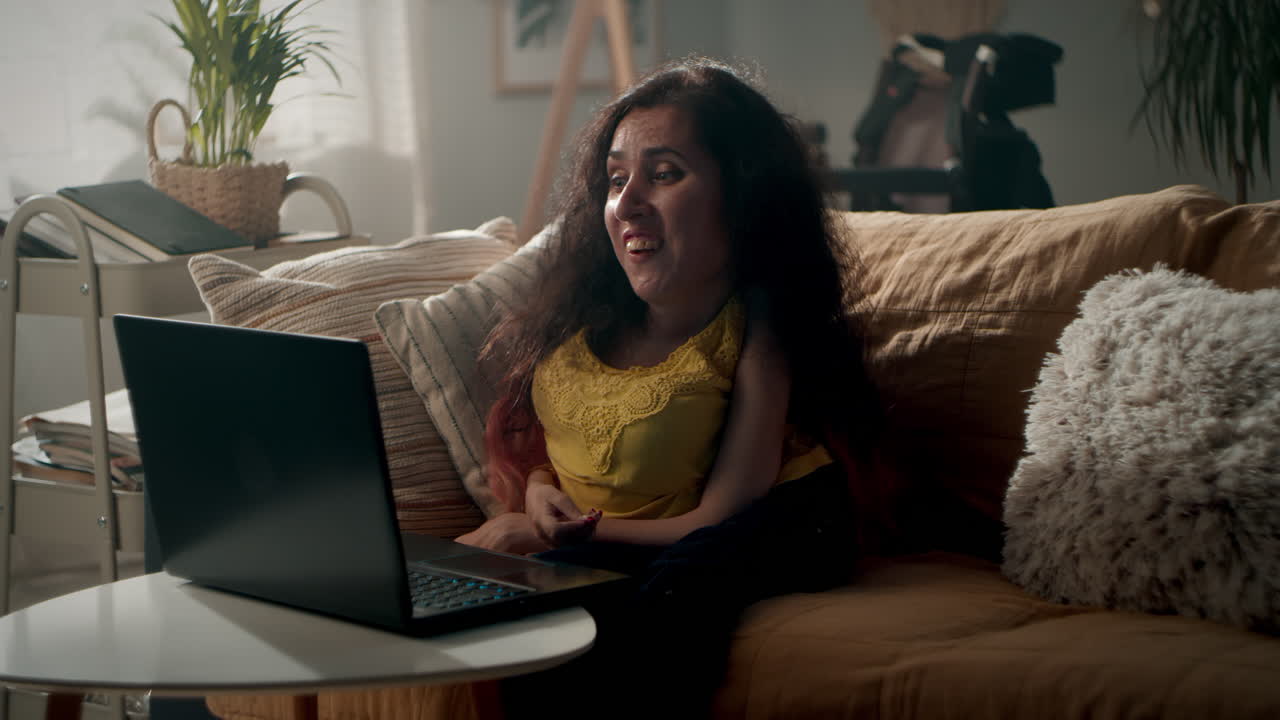 Woman with a Disability Having Video Call