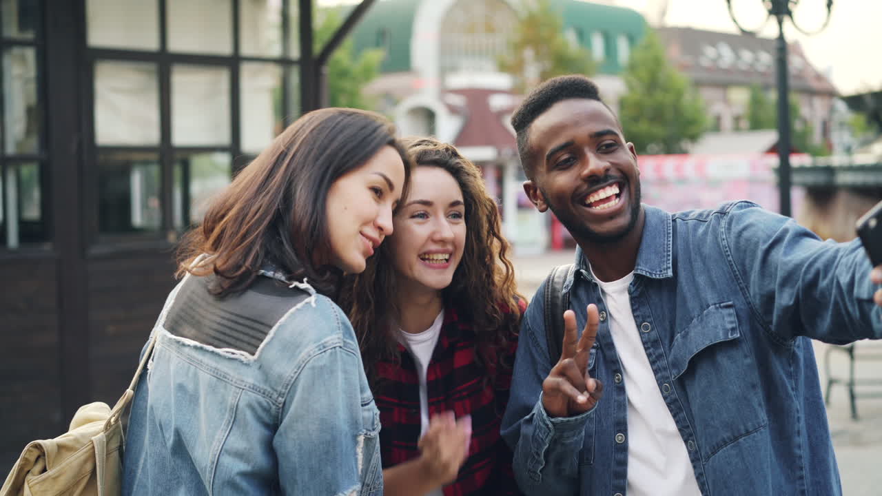 Friends taking a selfie in the city