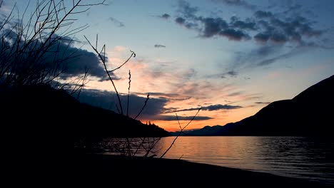 inspiration sunset on lake with mountains in background