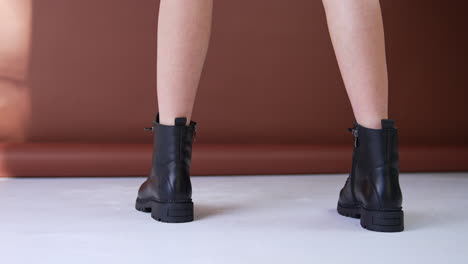woman's black leather ankle boots