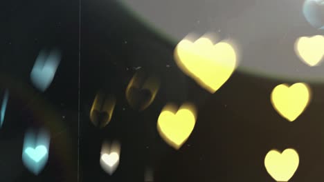 corazones borrosos sobre un fondo negro