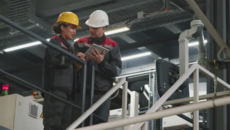 plant workers using digital tablet