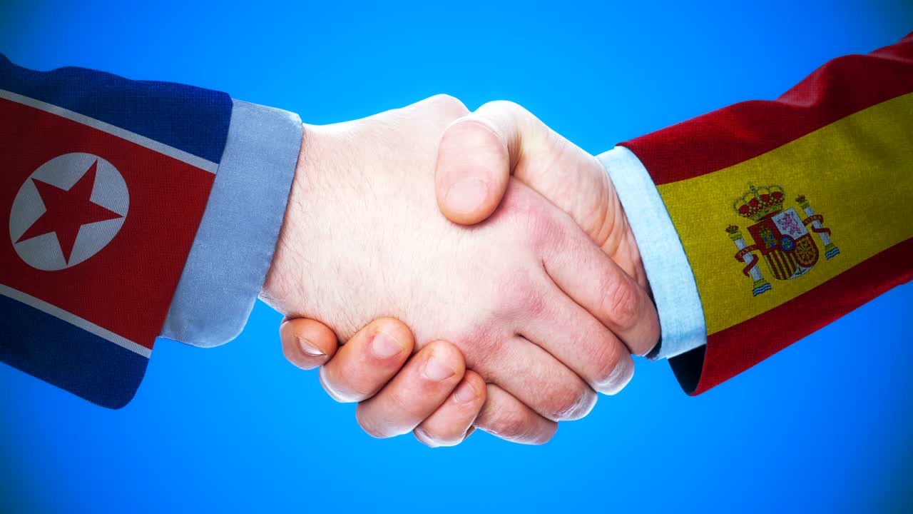 Corea del Norte - España / Animación conceptual de apretón de manos sobre países y política / Con canal alfa