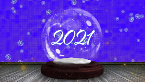animación de los saludos de la temporada texto en globo de nieve y estrella fugaz sobre fondo azul