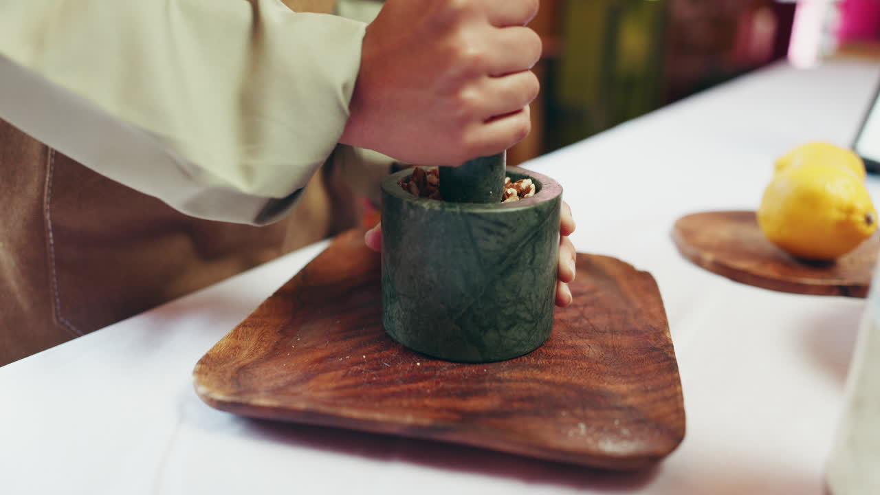 Preparing food with mortar and pestle