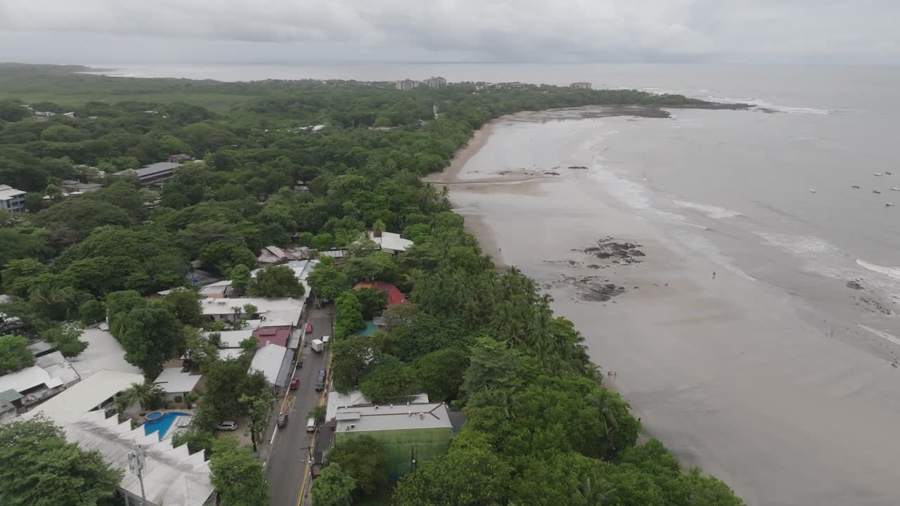 Downtown in Tamarindo, Guanacaste Province in Costa Rica with drone moving forward