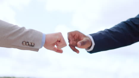 Business-men,-fist-bump-and-hands-with-support