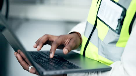 black man, hands and laptop of electrician typing